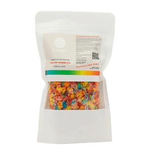 A sealed white pouch with a clear window displaying a colorful Fruity Pebbles cereal bar and a label reading "KANNA Cereal Bar" with branding and product information.